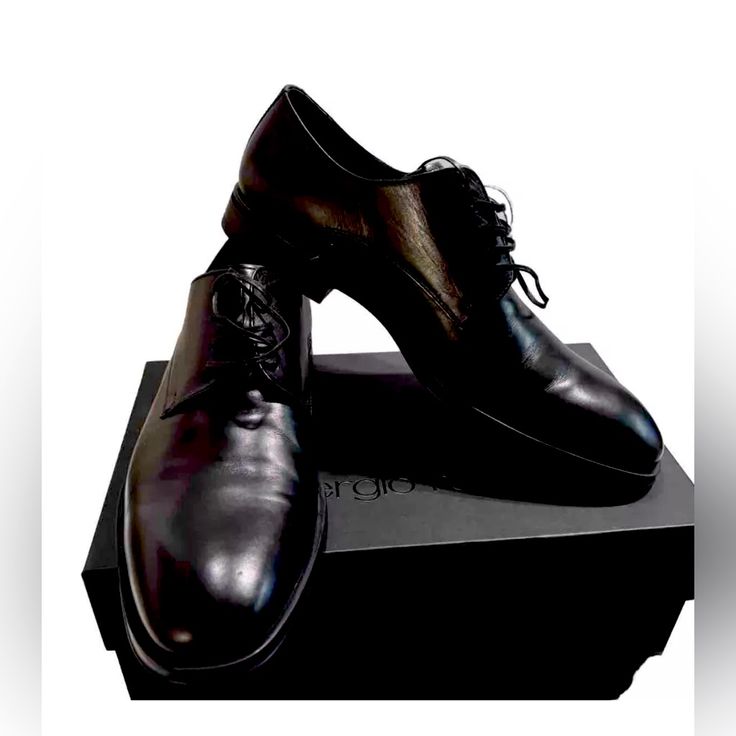 Elevate Your Formal Wear With These Sleek Black Dress Shoes From Sergio Rossi. Designed For The Modern Man, These Shoes Feature A Comfortable Fit And A Sophisticated Look. With A Size Of 11.5 In The Us Shoe Size, You're Sure To Find The Perfect Fit For Your Feet. The Brand Is Known For Their High-Quality Footwear, Making These Shoes A Great Investment For Any Wardrobe. The Black Color Adds A Timeless Touch To Any Outfit, Making Them Versatile For Any Occasion. Perfect For The Office Or A Special Fitted Low-top Dress Shoes With Leather Sole, Formal Lace-up Shoes With Pointed Toe And Removable Insole, Fitted Low-top Business Oxfords, Fitted Low-top Oxfords For Business, Party Oxfords With Branded Insole And Plain Toe, Modern Plain Toe Dress Shoes For Party, Modern Plain Toe Party Dress Shoes, Modern Party Dress Shoes With Plain Toe, Modern Business Leather Shoes With Branded Heel Counter