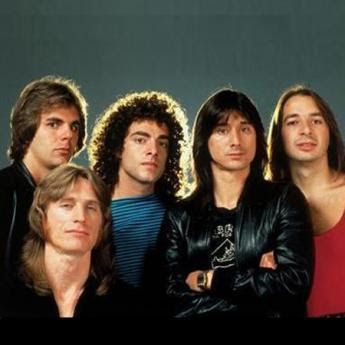 an image of group of people with long hair and leather jackets posing for the camera