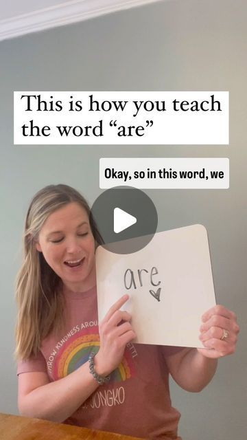 a woman holding up a piece of paper that says, this is how you teach the word'are '