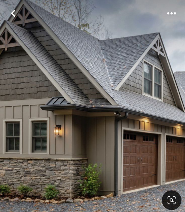 an image of a house with two garages