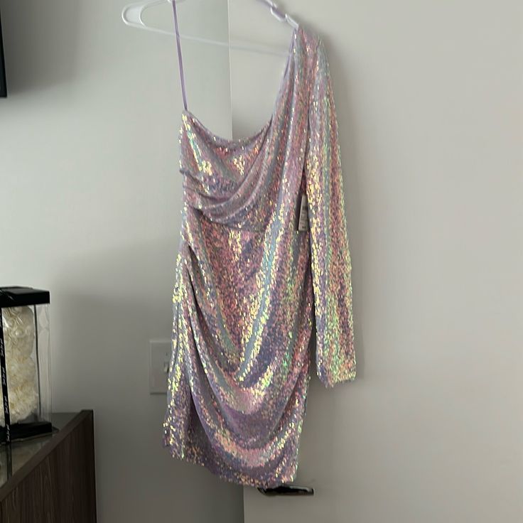 Lavender Glamorous Lavender Mini Dress For Evening, Glamorous Lavender Dresses, Fitted Lavender Party Dress, Fitted Lavender Dress For Party, Spring Purple Sequin Dress For Night Out, Purple Sequin Mini Dress For Spring, Purple Sequin Dress For Spring Night Out, Purple Sequin Dress For Night Out In Spring, Purple Mini Sequin Dress For Spring