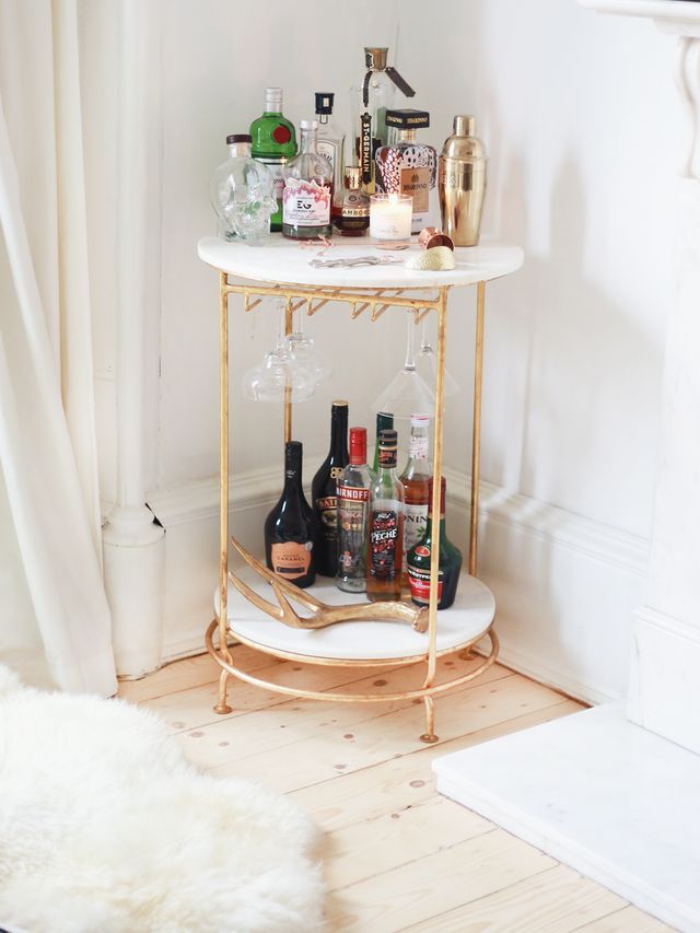 a table with bottles and glasses on it