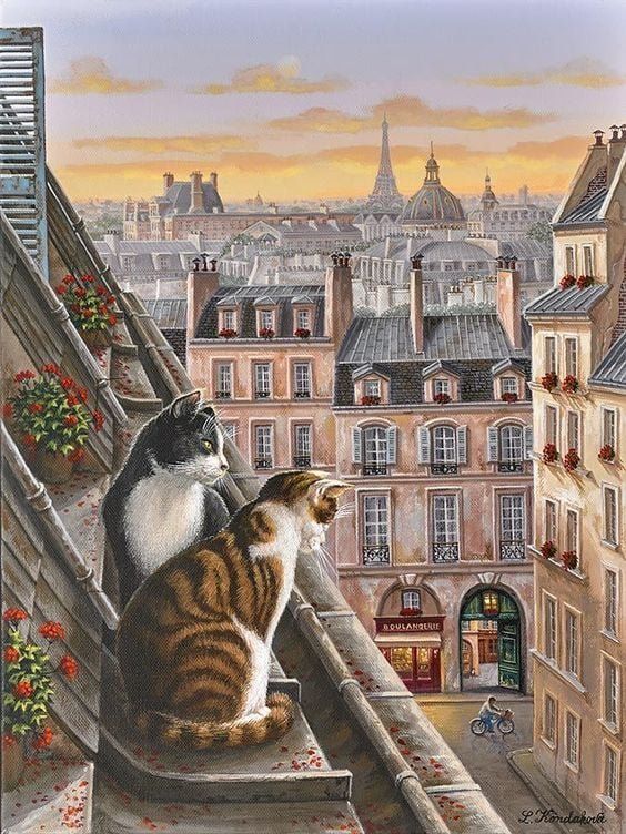 two cats sitting on top of a balcony looking at the cityscape in paris