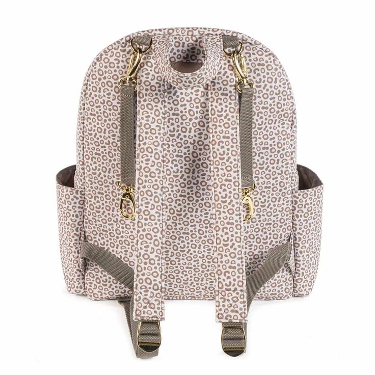 Brand: Pasito a Pasito Reference: 1120900117 Color: Brown Materials: 100% pvc Dimensions: 30X38X14cm Care: Wash by hand. Do not tumble dry. Do not use bleach. Description: London Animal Print backpack in printed simileather with beige. High capacity to carry everything you and your baby need. Interior and exterior pockets to have everything at hand and in order. Compartment for laptop or tablet. It has 2 large adjustable handles so you can use it hanging on the back and two other small handles s Large Capacity White Rectangular Diaper Bag, White Large Capacity Rectangular Diaper Bag, Large Capacity Rectangular White Diaper Bag, White Large Capacity Tote Backpack, White Backpack With Large Capacity, White Softback Backpack For On-the-go, White Rectangular Diaper Bag With Large Capacity, White Travel Tote Diaper Bag, White Travel Diaper Bag Tote