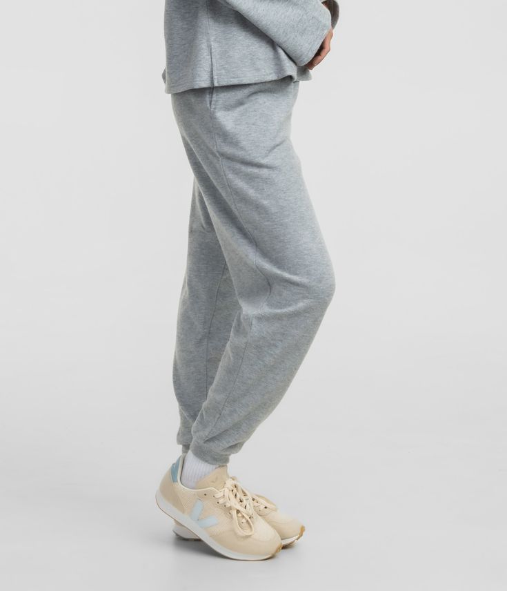 These double-sided brushed joggers are just what you need for those lazy days. These joggers provide the perfect blend of comfort and style. Wear with our Cozy Cloud Boatneck Top or as a separate. Sophie is 5’8” and is wearing a small Cozy Cloud Joggers in Oyster. Athleisure Accessories, Flannel Sweatshirt, Lounge Pants Womens, Southern Shirt, Loungewear Dresses, Resort Shirt, Cozy Loungewear, Southern Shirts, Fitted Joggers