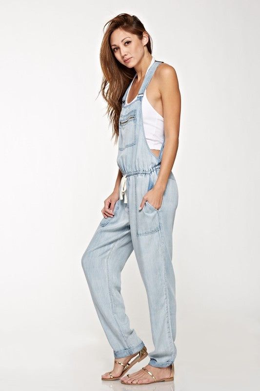 Perfect Denim Lightweight Overalls, drawstring waist, relaxed fit and the perfect pocket for your cell phone. Hippie Vibe Tribe has many overalls to choose from. These are perfect to wear in the summer heat with flip flops, add a turle neck for the cold cozy nights. Relaxed Fit Overalls For Spring Vacation, Vacation Overalls With Pockets, Casual Relaxed Fit Overalls For Vacation, Cotton Overalls With Pockets For Vacation, Relaxed Jumpsuits And Rompers With Pockets For Spring, Casual Cotton Overalls For Vacation, Relaxed Fit Overalls For Vacation, Trendy Cotton Overalls For The Beach, Relaxed Summer Jumpsuits And Rompers With Pockets