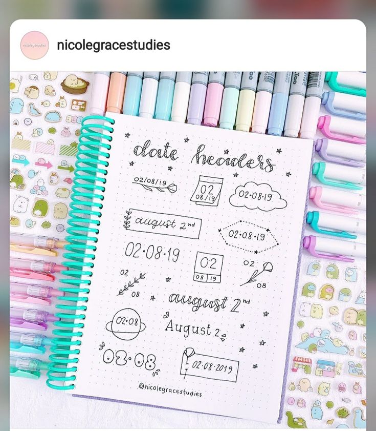 a notebook with some stickers on it next to pens and paper sheets that say date schedules