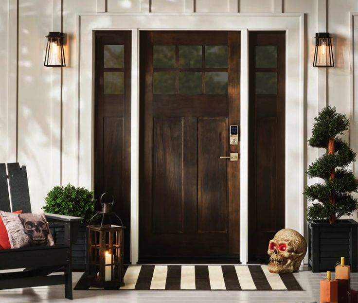 a front porch with black and white stripes on the floor