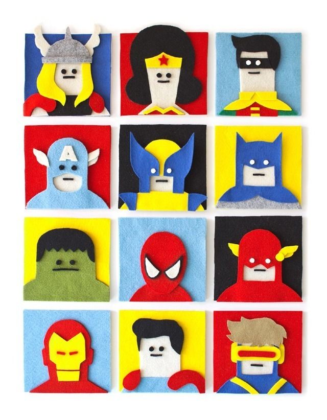 an assortment of paper cut outs with superheros and villain faces on them, all in different colors