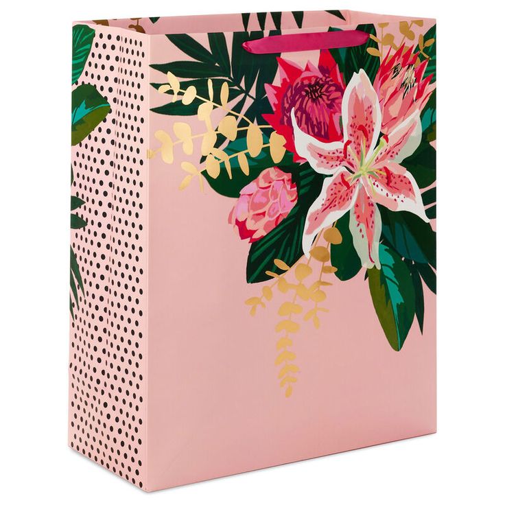 a pink shopping bag with flowers on it