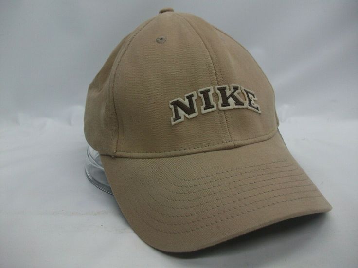 Up for sale is this Nike Hat  Beige Stretch Fit Baseball Cap The hat is in gently worn condition Nike Baseball Cap, One Size Fits Most, Adjustable Vintage Sports Hats, Nike Baseball Cap Snapback, Nike Adjustable Snapback Baseball Cap, Adjustable Nike Baseball Cap, Nike Adjustable Dad Cap, Nike Adjustable Dad Hat With Curved Brim, Vintage Beige Visor Hat, Nike Dad Hat With Curved Brim