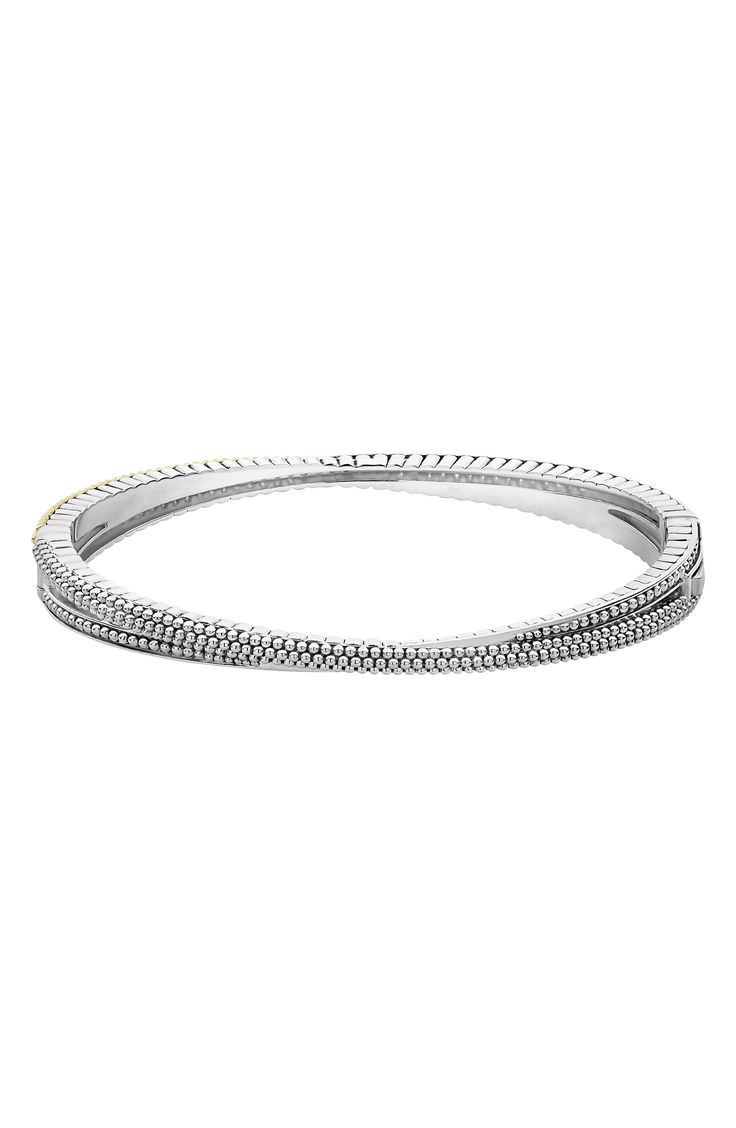 Crossed bands of sparkling diamonds and 18-karat gold Caviar beading create a stunning effect on this sterling silver bangle. Style Name:Lagos Caviar Lux Diamond Bangle. Style Number: 6115370. Available in stores. Silver Stackable Tennis Bracelet In Fine Jewelry Style, Stackable Silver Tennis Bracelet, Silver Stackable Diamond Bracelet Fine Jewelry, Silver Stackable Diamond Bracelet For Anniversary, Silver Diamond Stackable Bracelet, Stackable Silver Diamond Bracelet, Sterling Silver Bangle Bracelet With Pave Setting, Fine Jewelry Silver Diamond Cut Bangle, Fine Jewelry Silver Bangle With Diamond Cut