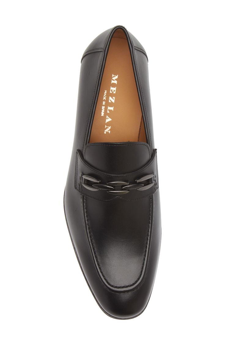 A sophisticated loafer crafted in Spain from flexible leather is elevated with a chain-inspired bit made of high-polish metal. Cushioned insole Leather upper and lining/rubber and leather sole Made in Spain Elegant Calf Leather Tassel Loafers With Moc Toe, Elegant Moc Toe Business Moccasins, Elegant Tassel Loafers With Moc Toe For Office, Elegant Office Tassel Loafers With Moc Toe, Formal Calf Leather Loafers With Horsebit Detail, Elegant Moc Toe Loafers For Business Casual, Elegant Formal Moccasins With Leather Sole, Elegant Loafers With Horsebit Detail In Calf Leather, Elegant Horsebit Loafers In Calf Leather