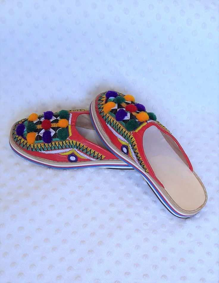 "Moroccan Berber Slippers for Women FREE SHIPPING  ♥ Details ♥ Material : Leather Region : Morocco, Maghreb, Maroc, vallée du Draa Culture : Traditional Moroccan Babouche Use : Women's adornment Weight : 170 g Sizes : we have all sizes Just write your sizes it in Personalization ♥ The slippers is original very good quality .the is best quality in Morocco. Women's Berber Slippers, also called \"Babouches\", are traditional shoes handmade in Morocco. These slippers are made by skilled Berber artis Multicolor Slip-on Beach Mules, Multicolor Slip-on Mules For Beach, Bohemian Handmade Slip-on Slippers, Handmade Bohemian Closed Toe Slippers, Traditional Closed Toe Mules For Beach, Traditional Closed Toe Mules For The Beach, Traditional Mules For Beach In Spring, Multicolor Closed Toe Slippers For Beach, Traditional Handmade Slippers For Spring