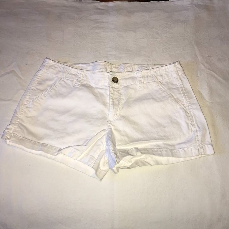 Nwot White Shorts. 4 Pocket With Button And Zipper Front Closure. Cotton/Spandex Mix Sz 7. Tags Removed And Never Worn. Inseam: 2 1/2" Waist: 30" Rise: 8" Dark Denim Shorts, High Rise Denim Shorts, Arizona Jeans, Distressed Shorts, Distressed Denim Shorts, High Rise Denim, Khaki Chinos, Pocket Jeans, Dark Wash Denim