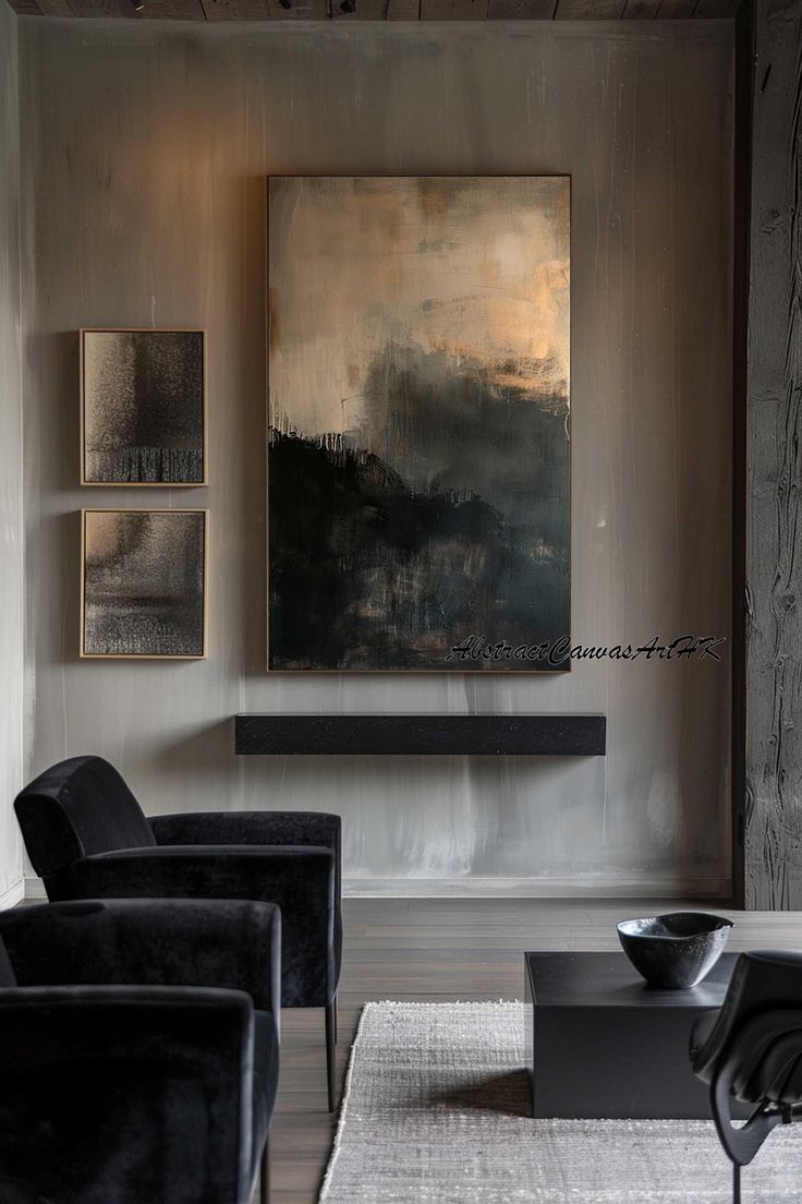 a living room filled with furniture and a painting on the wall