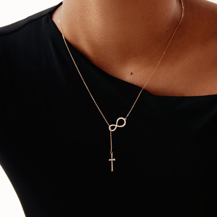 Infinity Cross Necklace This stunning Infinity Cross Necklace in 14K Gold is the perfect symbol of eternal love and faith. Crafted with delicate detail, this necklace is a timeless piece that will complement any outfit. Give a gift that will be cherished for years to come or treat yourself to this beautiful accessory. You'll have: 14k solid gold handcrafted necklace 100% US sourced jewelry Size Material: 14k Solid Gold Pendant Height: 7.5 mm / 0.30 in Pendant Width: 16 mm / 0.63 in Chain Style: Infinity Cross, Love And Faith, Gold Schmuck, White Gold Necklaces, Diamonds And Gold, Handcrafted Necklace, P T, Delicate Details, Eternal Love