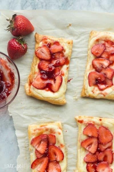 strawberry cream cheese danish with fresh strawberries on top