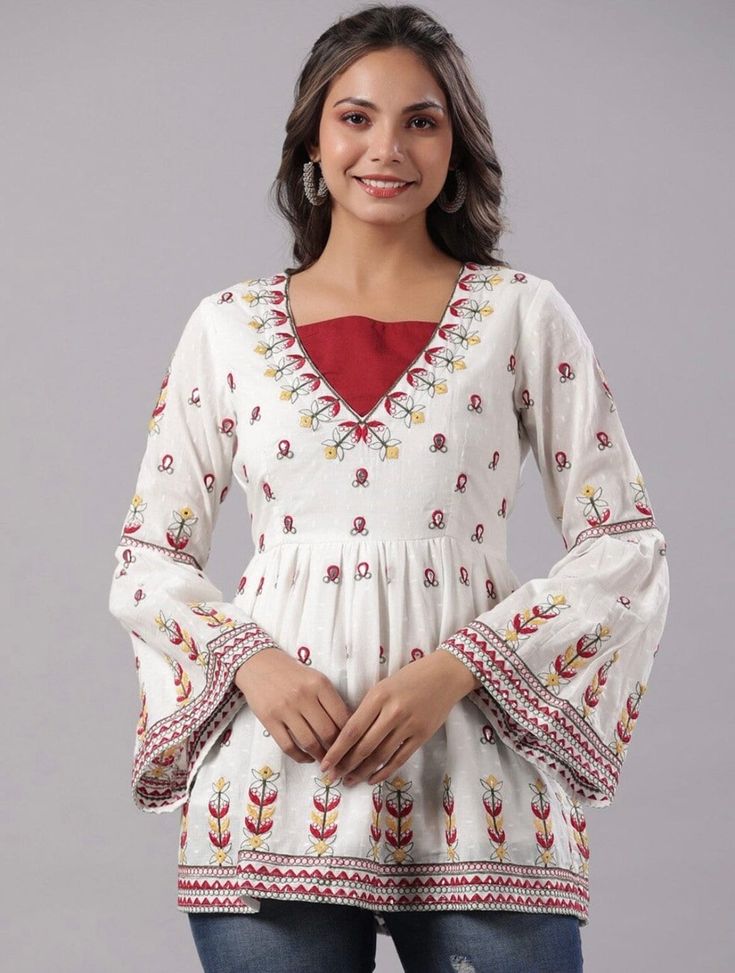 * Red & White Embroidered Cotton Dobby Tunic Printed Kurti / Embroidered Short Kurti / Indian Tunic / Summer-Spring Evening Dress / Cotton Tunic Tops Boho Tunic / Hippie Dress / Tribal Print Top * Red and White embroidered a-line kurti * Embroidered detailing  * Round neck, three-quarter, bell sleeves * Pure cotton *Fabric:-  Cotton Donny *Wash Care:-  Hand-wash AVAILABLE IN 6 SIZES THEY ARE IN FOLLOWING MEASUREMENTS IN INCHES:- XS:- Bust-34/Waist-28/Length-29 S:- Bust-36/Waist-30/Length-29 M:- Bust-38/Waist-32/Length-29 L:- Bust-40/Waist-34/Length-29 XL:- Bust-42/Waist-36/Length-29 XXL:- Bust-44/Waist-38/Length-29 NOTE ►►CUSTOMISATION We do customisation ️ ►►TRACKING We give full tracking to our valuable customers, you can track your package any time with tracking code provided by our sho Traditional Red Block Print Top, Festive Traditional Tops With Printed Motifs, Traditional V-neck Top With Chikankari Embroidery, Bohemian Tops With Resham Embroidery For Navratri, Anarkali V-neck Top For Festivals, Festive Anarkali V-neck Top, Festive White Cotton Tops, Traditional Block Print Festive Tops, Festive Cotton Tops With Printed Motifs