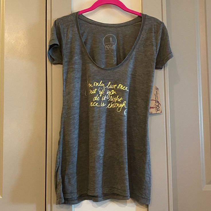 Super Soft T-Shirt. Gold Foil Print Quote. “You Only Live Once, But If You Do It Right, Once Is Enough.” Bundle And Save. Bundle 3+ For 20% Off! Fitted Gray T-shirt With Letter Print, Fitted Gray Text Print T-shirt, Fitted Gray T-shirt With Text Print, Casual Gray Scoop Neck T-shirt, Heather Grey Relaxed Fit Top With Screen Print, Fitted Gray Graphic Tee, Only Live Once, Gold Foil Print, Do It Right