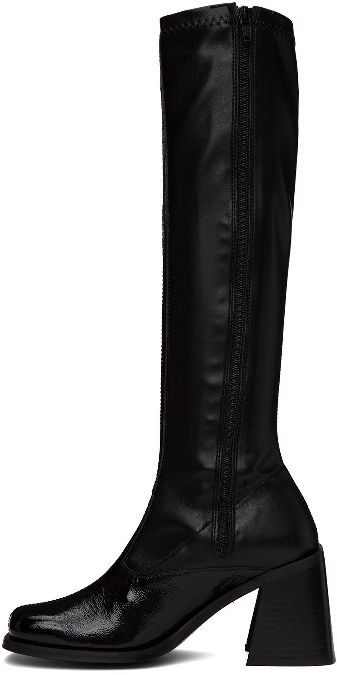 Handcrafted knee-high paneled grained patent leather and stretch faux-leather boots in black. · Square toe · Zip closure at inner sides · Padded leather footbed · Stacked leather block heel with rubber injection · Buffed leather sole · Heel: H3.25 in Supplier color: Black Sleek Fitted Knee-high Faux Leather Boots, Sleek Fitted Faux Leather Knee-high Boots, Fitted Knee-high Boots With Pointed Toe In Polyurethane, Sleek Black Tall Knee-high Boots, Black Faux Leather Knee-high Boots, Fitted Synthetic Knee-high Boots For Workwear, Sleek Knee-high Faux Leather Boots, Sleek Faux Leather Platform Boots, Fitted Knee-high Faux Leather Platform Boots