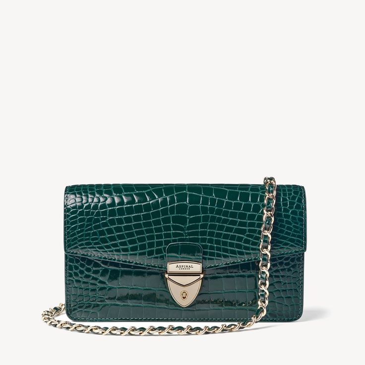 Mayfair Clutch 2 in Evergreen Patent Croc | Aspinal of London Timeless Rectangular Everyday Luxury Evening Bag, Classic Clutch With Palladium Hardware, Classic Rectangular Clutch For Everyday Luxury, Timeless Leather Evening Bag For Everyday Luxury, Elegant Green Bag With Palladium Hardware, Luxury Evening Bags In Textured Leather, Elegant Green Shoulder Bag With Palladium Hardware, Classic Evening Bag For Everyday Luxury, Elegant Green Shoulder Bag