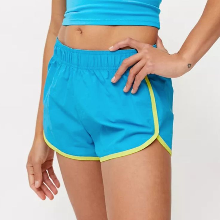 New With Tags. Sporty Pull-On Shorts By Urban Outfitters' In House Label, Out From Under, In A Lightweight Nylon Construction. Topped With An Elastic Waistband And Contrast Trim Along The Dolphin Hem. Blue Athleisure Bottoms With Built-in Shorts, Blue Stretch Shorts For Training, Blue Sporty Stretch Bottoms, Blue Stretch Training Shorts, Blue Sportswear Bottoms For Training, Blue Athletic Shorts With Built-in Shorts For Spring, Blue Stretch Nylon Shorts, Sporty Blue Training Bottoms, Casual Summer Training Bottoms