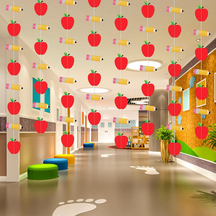 the hallway is decorated with apples hanging from the ceiling and colorful decorations on the walls