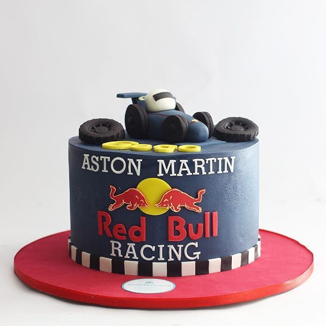 a red bull racing cake on a plate