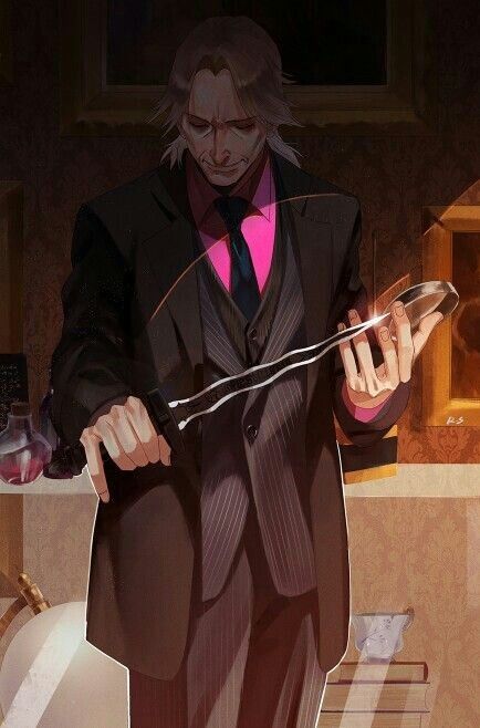 a man in a suit and pink shirt holding scissors