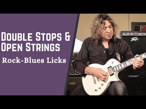 a man playing an electric guitar with the words double stops and open strings rock - blues licks