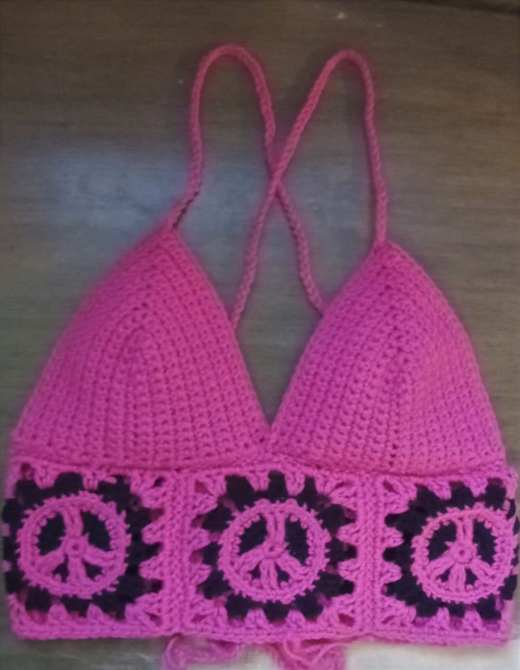 You'll have so much fun wearing this  crocheted crop top this summer with peace signs! ** Custom made to order. This is bubble gum/hot pink! Or you can choose all black top, or one side hot pink and the other black! May also choose any of your favorite colors for the top and peace signs. Pink Casual Triangle Crop Top, Casual Pink Triangle Crop Top, Casual Handmade Pink Tops, Trendy Pink Triangle Crop Top, Pink Cropped Top For Festival, Casual Pink Cropped Halter Top, Pink Crochet Halter Top For Spring, Spring Pink Crochet Halter Top, Handmade Pink Crop Top For Summer