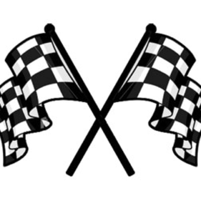 two crossed checkered flags flying in the wind