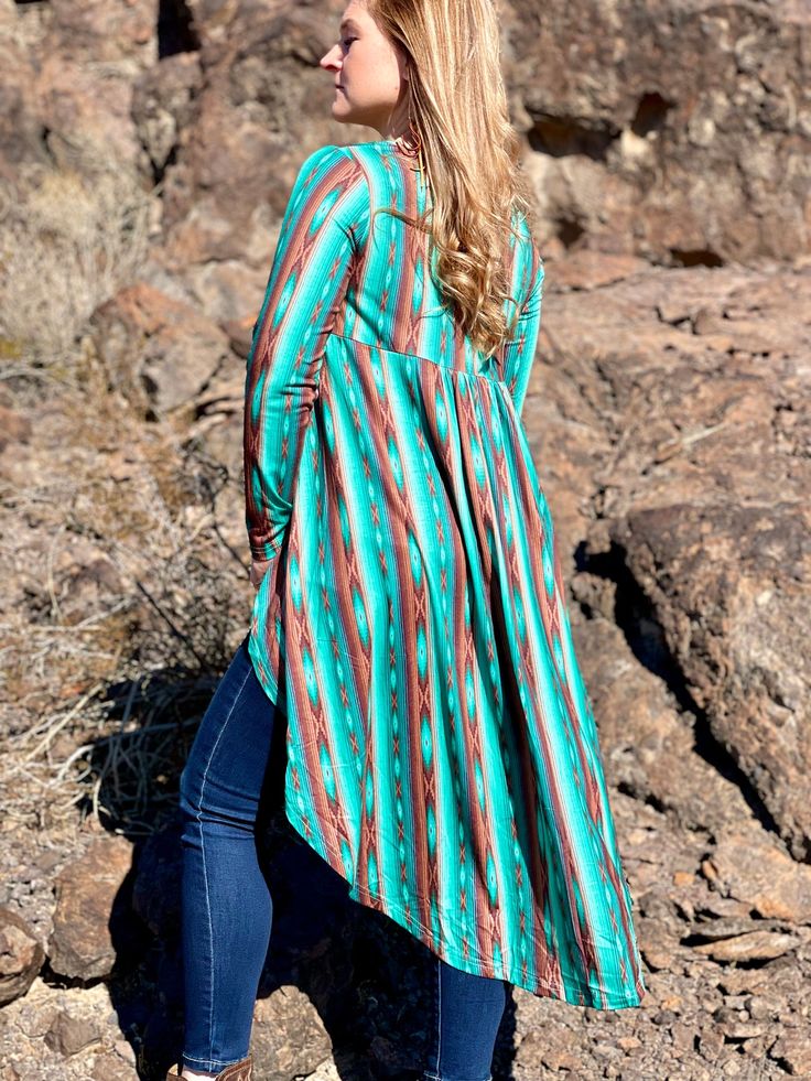 Montana Hi-Low top – The Feisty Bull Boutique Green Boho Print Long Sleeve Top, Green Long Sleeve Top With Boho Print, Green Long Sleeve Boho Print Top, Spring Ikat Print Long Sleeve Tops, Spring Long Sleeve Ikat Print Tops, Casual Ikat Print Patterned Top, Patterned Ikat Print Long Sleeve Tops, Fitted Boho Print Long Sleeve Top, Printed Long Sleeve Top For Fall