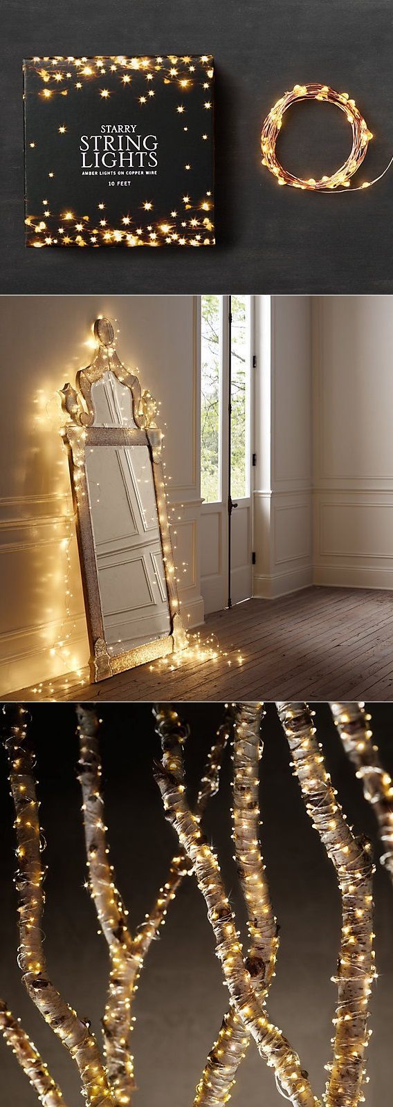 a large mirror sitting on top of a wooden floor next to a door covered in fairy lights