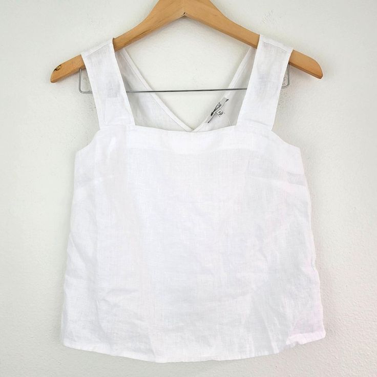 Madewell Irene 100% Linen Cross Back Sleeveless White Top Size 00 Minimalist New Style And Materials: Coming In Breezy 100 Percent Linen, This Square-Neck Tank Has A Relaxed Fit And Crisscross Back. Regular Fit. Length: Designed To Hit Between The Belly Button And High Hip. Minimalist, Boho, Contemporary, Madewell, Linen Size: 00 Please See Photos For Measurements (In Inches) Condition: New With Tags. Flaws: Brand Tag Crossed With Marker. See Pics For More Details. Non Smoking Home All Our Items Spring Cotton Tank Top With Wide Straps, Cotton Tops With Wide Straps For Summer, Fitted Linen Tank Top For Everyday, Spring Tops With Wide Straps, Everyday Spring Sleeveless Tank Top, White Linen Sleeveless Vest, White Tank Top With Wide Straps For Spring, Spring Everyday Tops With Wide Straps, Spring Tops With Wide Straps For Everyday