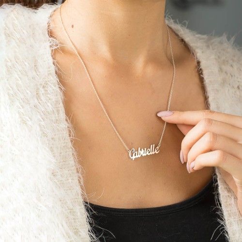 Fun and unique, our name necklace is the perfect way to express yourself. Using the font that best fits you, design your name in our Classic style or upgrade to our Premium thickness. Personalize in sterling silver, white, yellow, or rose gold, and add a charm to match your personality. Complete your necklace with a choice of matching chains, or add a little extra sparkle with a cable chain featuring a 2mm bezel-set satellite natural diamond. Silver Name Necklace, Name Necklace Silver, Sterling Silver Name Necklace, Good Luck Necklace, Evil Eye Necklace Gold, Diamond Initial Necklace, Dainty Diamond Necklace, Gold Letter Necklace, Gold Name Necklace