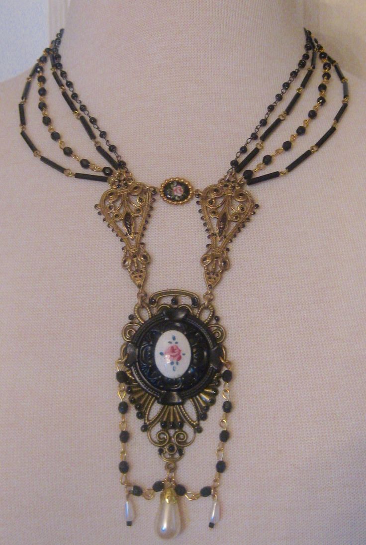 This Victorian reproduction necklace is the first offering  in our new line of Victorian/Edwardian inspired jewelry, from Orsini-Medici Embellishments.   As authentic Victorian and Edwardian jewelry can sometimes be cost prohibitive,  I wanted to design a line that had all of the charm, elegance, and details of the real thing, but at price points that are affordable.   Many of the findings and stampings are made from authentic period molds of the era. You will find a mix of materials in this col Elegant Baroque Necklace With Historical Design, Victorian Pendant Necklace With Historical Design, Victorian Jewelry With Historical Design For Evening, Ornate Jeweled Necklaces, Victorian Baroque Formal Jewelry, Baroque Necklace With Historical Design As A Gift, Baroque Historical Design Necklace For Gift, Victorian Necklace With Historical Design For Formal Occasions, Victorian Historical Design Necklaces For Formal Occasions