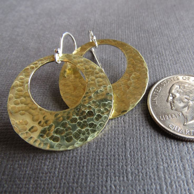 Modern Hammered Drop Earrings, Modern Hammered Dangle Jewelry, Gold Round Soldered Earrings, Gold Round Earrings With Soldered Details, Hammered Metal Round Earrings, Artisan Hammered Metal Earrings, Artisan Hammered Dangle Jewelry, Hammered Silver Brass Earrings, Silver Hammered Brass Earrings