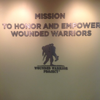 the sign on the wall says, mission to honor and empower wounded warrior's