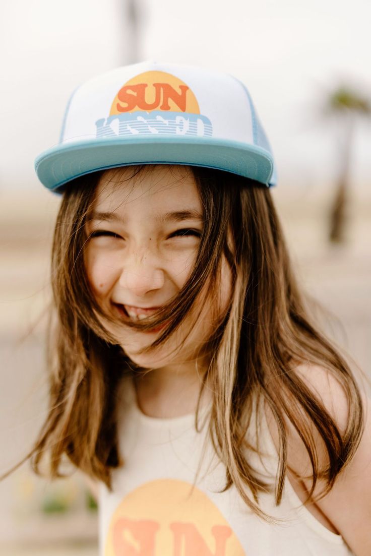 Summer is for sunkissed hair! Enjoy the ocean breeze while walking the boardwalk in this trucker hat. Made in Los Angeles Summer Snapback Trucker Hat With Upf 50+, Upf 50+ Summer Trucker Hat, Summer Trucker Hat With Upf 50+, Summer Trucker Hat With Upf 50+ Protection, Summer Trucker Hat With Upf 50+ And Curved Brim, Spring Vacation Trucker Hat, Blue Fun Snapback Hat For Summer, Fun Blue Snapback Hat For Summer, Cute Summer Snapback Hat With Curved Brim