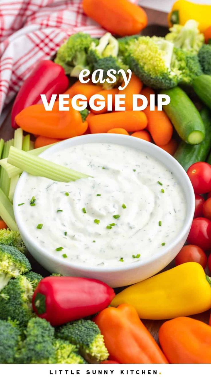 an easy veggie dip in a bowl surrounded by vegetables