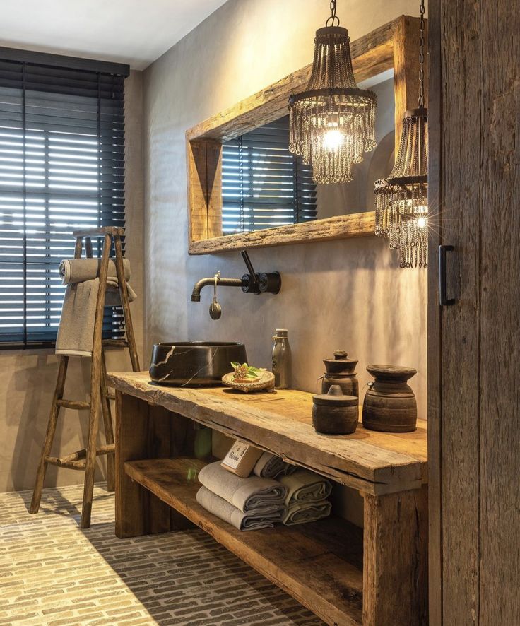 a bathroom with a sink and wooden shelves