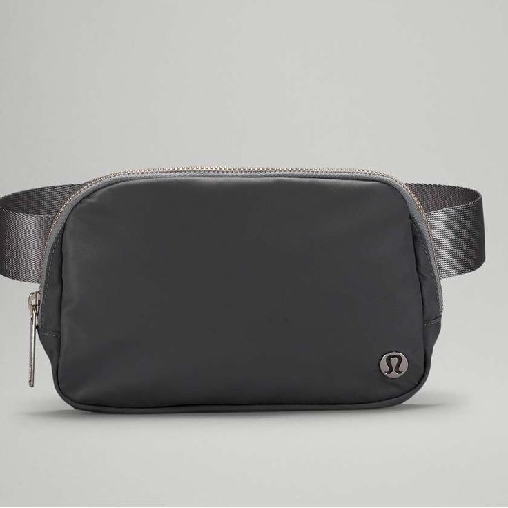 Lululemon Everywhere Belt Bag 1l Asphalt Grey New With Tags 1l One Size Original Strap Lululemon Belt Bag Grey, Lululemon Backpack, Lululemon Belt Bag, Lululemon Bags, Lululemon Everywhere Belt Bag, Everywhere Belt Bag, Pink Wristlet, Everyday Backpack, Running Belt