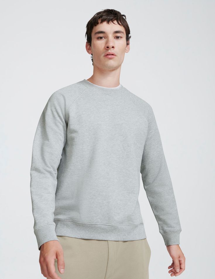 An understated sweatshirt is a modern-day essential with endless versatility. Inspired by the classic varsity style, we reinvented the raglan sleeve version with our luxury Loopback French Terry fabric and finished the piece with single-line clean stitching. Team yours with our tapered sweatpants or smarten it up by layering over a plain white collared shirt.

Constructed from an exceptionally soft, yet structured, loopback french terry fabric using our premium Peruvian Pima cotton.

We recommen Gray Crew Sweatshirt For Layering, Gray Crew Neck Sweatshirt For Layering, Sporty Raglan Sleeve Sweater With Ribbed Cuffs, Solid French Terry Sweats For Everyday, Relaxed Fit Sweater With Ribbed Cuffs And Raglan Sleeves, Solid Color Athleisure Sweatshirt For Everyday, Everyday Athleisure Sweatshirt With Ribbed Cuffs, Athleisure Solid Color Sweatshirt For Everyday, French Terry Athleisure Sweats For Everyday