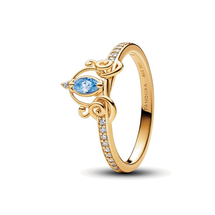 Midnight is just the beginning. Get ready to have a ball with the Disney Cinderella's Carriage Ring, showcasing a blue marquise-shaped stone at the centre. Swirling openwork shapes in 14k gold plating form the enchanted carriage motif and connect to the ring band, which is set with sparkling clear cubic zirconia pavé on half of the band. Style it with your favourite gold-toned pieces or pair with other Cinderella-inspired pieces for a look that will shine just as brightly before AND after midnig Cinderella's Carriage, Disney Rings, Pandora Disney, Bracelet Pandora, Pandora Rings, Pandora Bracelets, Gold Plated Rings, Ring Size Guide, Ring Band