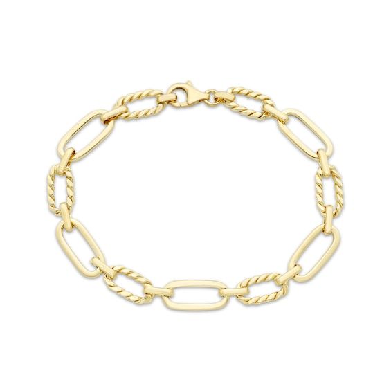 This Italian-made bracelet is the versatile style staple your look needs. Crafted in 10K yellow gold, polished and twisted oval-shaped links alternate to create the chic design. The 7.5-inch bracelet secures with a lobster clasp. Twist Bracelet, Twisted Bracelet, Initial Bracelet, Versatile Style, The Chic, Chic Design, Lobster Clasp, Cool Things To Buy, Apparel Accessories