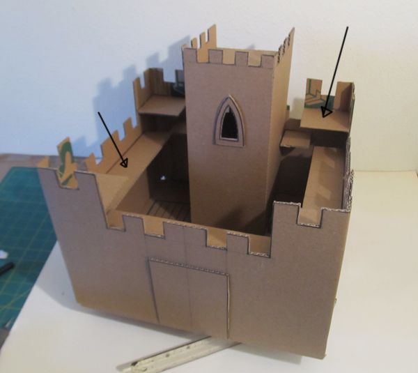 a cardboard castle made to look like it has been cut out