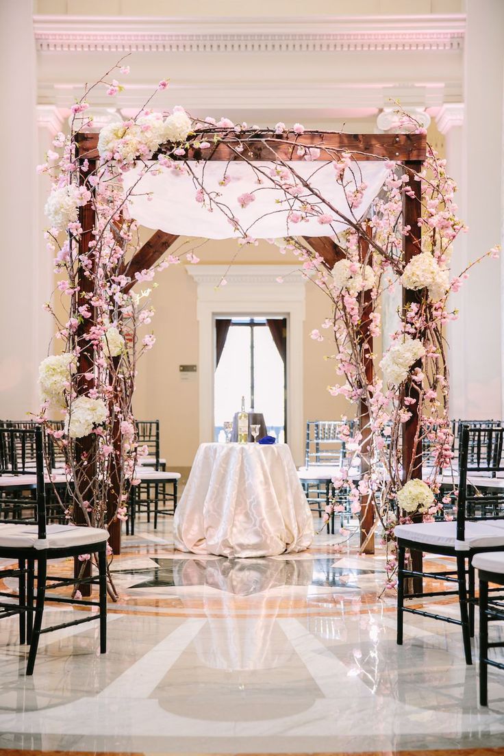 an elegant wedding setup with white and pink flowers