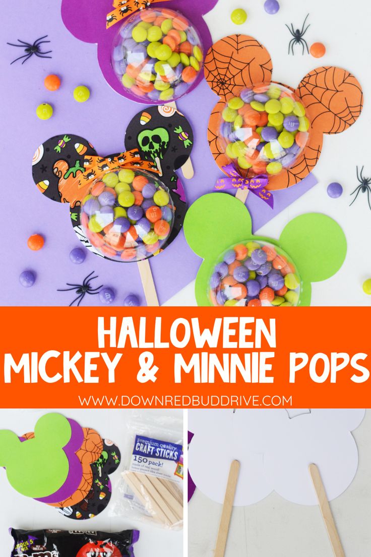 halloween mickey and minnie pops with candy on sticks in front of the image, there is a